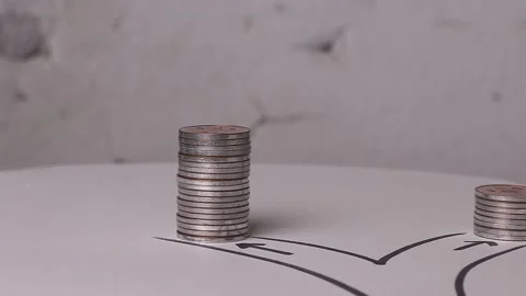 Two paths with different heights of coins. Stock Footage 232595573