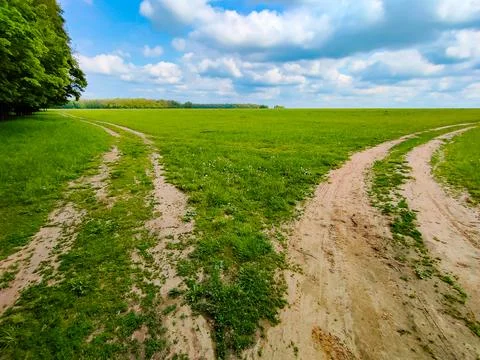 Two paths going in different directions. Concept of choosing a direction. Stock Photos