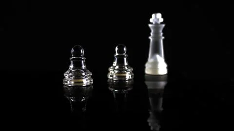 Two Pawns One King Stock Photos