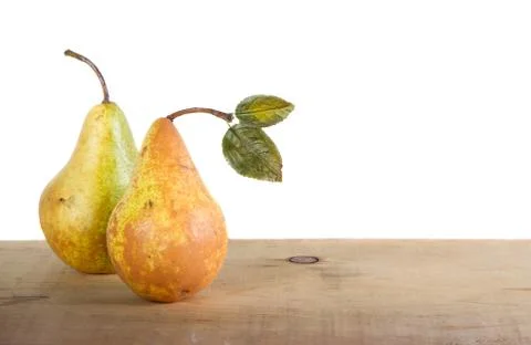 Two pears on a plank Stock Photos