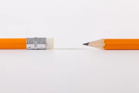 Two pencils on the white table Photos