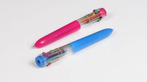 Two pens with colored refills on a white. Ten different colors. Stock Footage 170374796