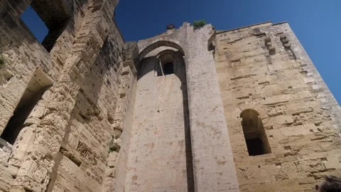 Two People With Bicycle Admiring Ancient Stone Building in France on Sunny Day Vídeos de archivo 346050976