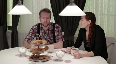 Two people at a cafe drinking coffee Stock Footage 62874491