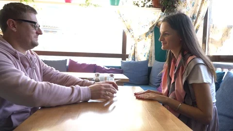 Two people in cafe enjoying the time spending with each other Stock Footage 89258849