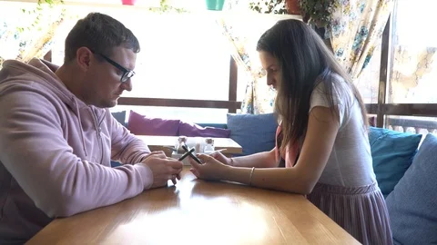 Two people in cafe enjoying the time spending with each other Stock Footage 89258875