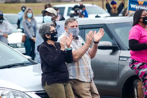 Two people clapping Stock Photos