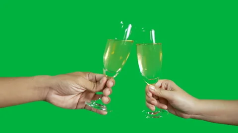 Two people clinking each other's with glass of champagne. Stock Footage 132647537