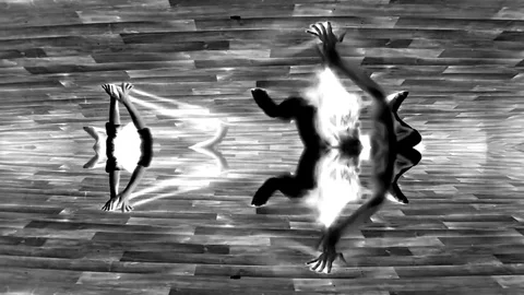 Two People Dance In The Abstraction In The Front View With Shine And Dark Stock Footage 85321217