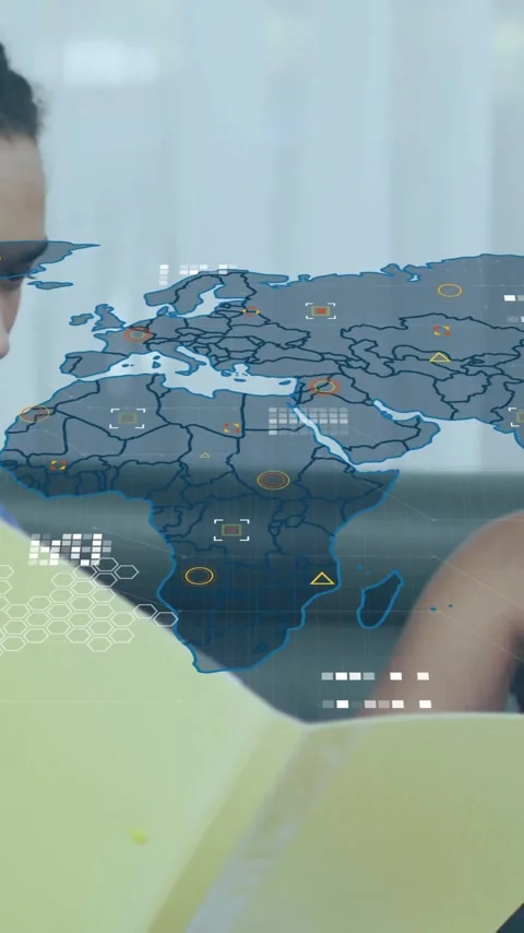 Two people discussing documents with world map and data overlay animation Stock Footage 319727425