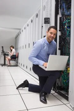 Two people doing data storage Stock Photos