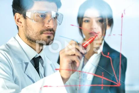 The two people draw the graph at the virtual screen Stock Photos
