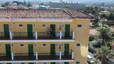 Two people with Drone in Puerto de la Cruz on Tenerife island 스톡 동영상 100445622