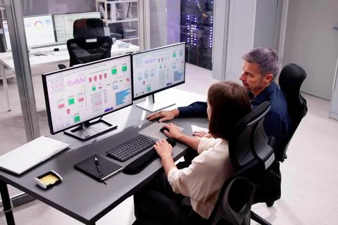 Two People Engaging in Computer Engineering 스톡 사진