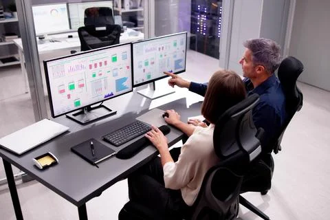 Two People Engaging in Computer Engineering Foto stock