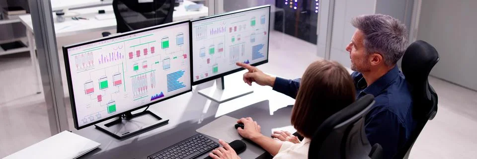 Two People Engaging in Computer Engineering Foto stock