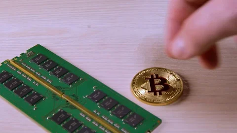 Two people exchange RAM for bitcoin. Deal. Cyber-currency. Economy. Purchase Stock Footage 106350744