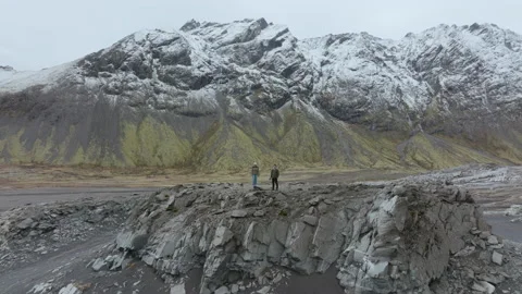 Two People in front of an epic mountain 4K 50FPS Stock Footage 218262351