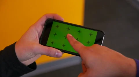 Two People Gesturing Swipes and Taps on iPhone 6 Green Screen Video stock 46080317