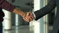 The two people handshake in office. slow motion 4k or 4k+ Resolution