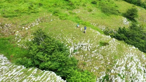 Two people in a hillside in Beriain mountain. Navarre. Stock Footage 140846588