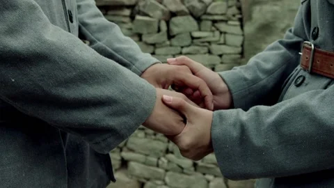 Two people holding hands Stock Footage 235271594