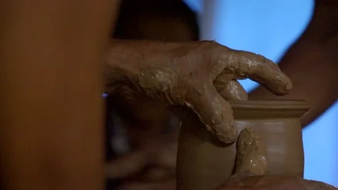 Two people making pottery Stock Footage 106205907