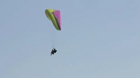 Two people on parachute Stock Footage