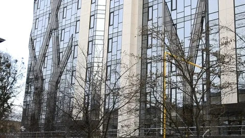 Two People Pass By The Building And The Third Enters The House Stock Footage 104264267