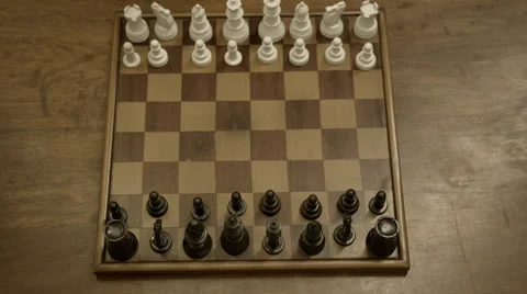 Two people playing chess shot from very high angle. Stock Footage 55551830