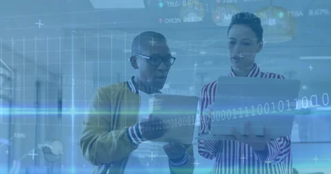 Two people reviewing documents with digital data processing animation overlay Stock Footage 305067469