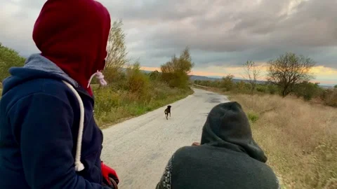 Two people riding tracker in Turkey during sundown Stock Footage 171043209