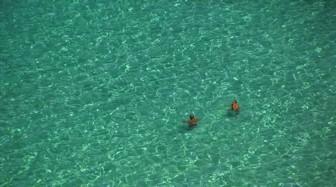 Two people in the sea Stock Footage 751047