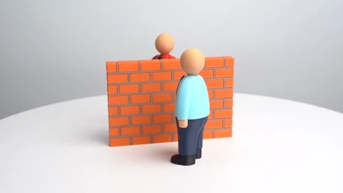 Two people separated by wall, misunderstanding and social conflict Stock Footage 330940179