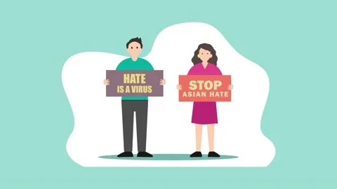 Two people showing poster stop asian hate Stock Footage 161217350