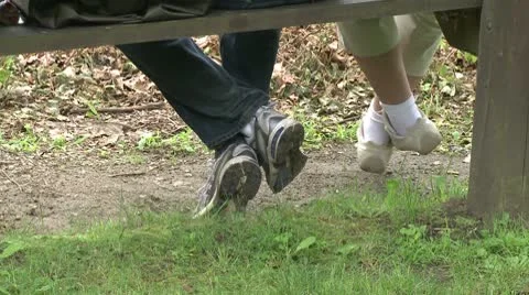 Two people sitting on a bench in a Nature Reserve (3 of 3) Stock Footage 10771638