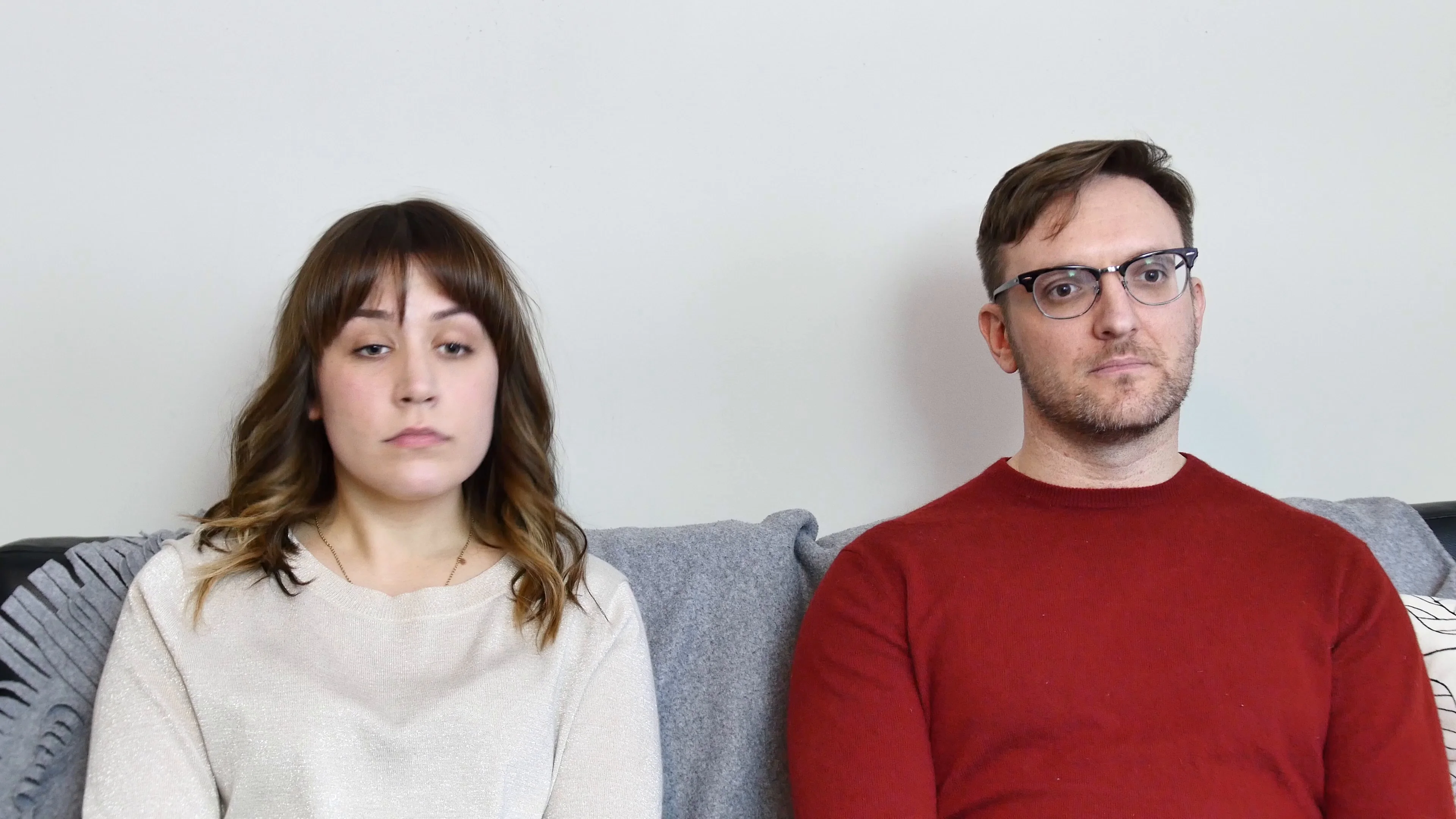 Two People Sitting On A Couch Stock Footage 85241518