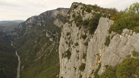 Two people standing on the top of high cliff in Verdon, France Stock Footage 101598811