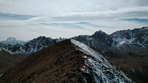 Two People Standing At Top Of Mount And Admiring Landscapes From Top, Aerial Stock Footage 254406471