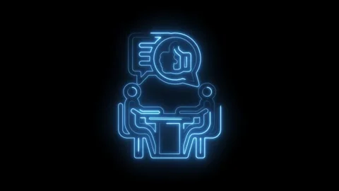 Two people at table with speech bubble and thumbs up icon glowing neon blue on Stock Footage 333957190