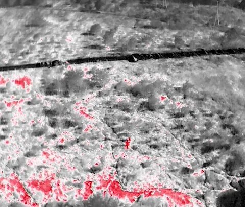 Two people in thermal camera drone Видео 217932715