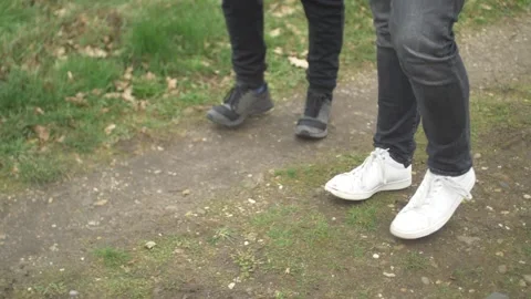 Two People Walking in Countryside Stock Footage 148277777