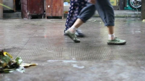 Two People Walking in Slow Motion Stock Footage 120732584