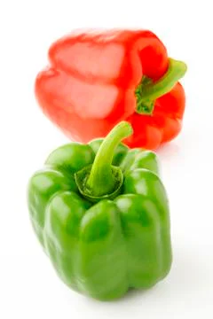 Two peppers on white background Stock Photos