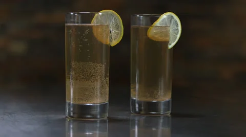 Two Perfect Glasses Of Ginger Beer With Lime On The Rim HD Video Stock Footage 26285063
