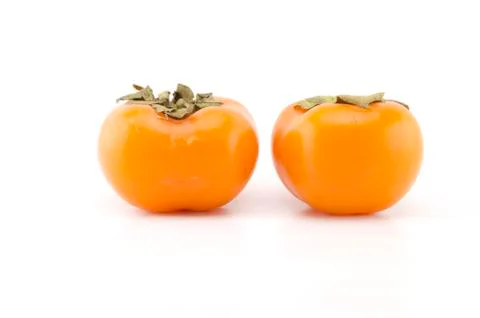 Two persimmon isolated on white background Foto stock