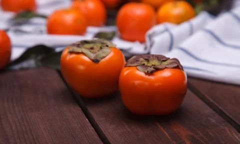 Two persimmons Stock Photos