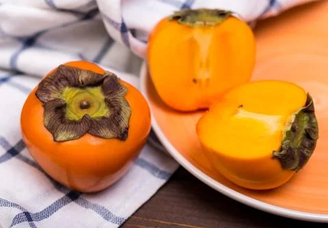 Two persimmons Stock Photos