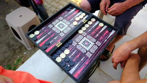 Two person are playing backgammon Stock Footage 249040896