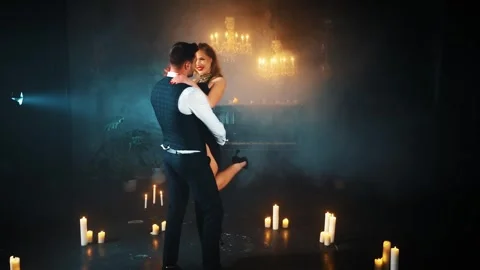 Two person fall in love Happy sexy couple dancing spinning man holding blonde Stock Footage 311829828